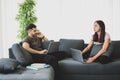 Work at home concept, Working from home, Couple using laptop working together in their living room. Corona virus, Covid-19, Stay