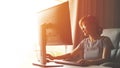 Young women working at home with her computer