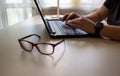 Work from home. Double exposure of business woman hand working on blank screen laptop computer on white desk as concept. Beautiful Royalty Free Stock Photo