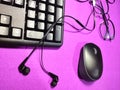 Work from home. office desk with keyboard, mouse, headshet, glasses and pen Royalty Free Stock Photo