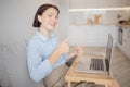 Work from home office, woman smiling showing thumbs up gesture, great job. Internet call center support Royalty Free Stock Photo