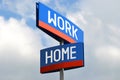 Work and home - street sign, sky in background Royalty Free Stock Photo