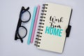 \'Work from home\' word on notebook