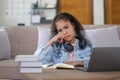 Work from home, Young asian woman struggle with laptop computer, Frustrated asia girl looking at laptop while studying Royalty Free Stock Photo