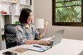 Work from home. Young business was glad that the job was done well Royalty Free Stock Photo