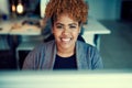 Work through the hours and youll shine through your success. Portrait of a young businesswoman working late in an office