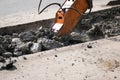 Construction of a new multi-storey building. The work of a jackhammer when laying the foundation