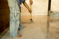 Work Lacquering concrete floors using roller for coating Royalty Free Stock Photo
