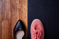 Work life balance choice concept: colored sneakers or sports shoes and strict office shoes Royalty Free Stock Photo