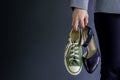 Work Life Balance Concept, present by Business Working Woman holding a High Heal and Sneaker Shoes, Croped image with Copy Space