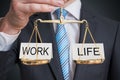 Work and life balance. Words are balanced on scales Royalty Free Stock Photo