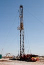 Work Over Rig, Pumpjack, and a Drilling Rig Royalty Free Stock Photo