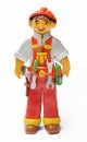Work in overalls with tools, made of plasticine. Royalty Free Stock Photo