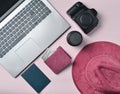 Work of the photojournalist. Laptop, wallet, passport, hat, came