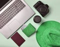 Work of the photojournalist. Laptop, wallet, passport, hat, came Royalty Free Stock Photo