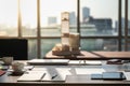 Work place and business concept. Working desk with white cup of hot coffee, notebook, pen, smartphone, tablet and laptop computer Royalty Free Stock Photo