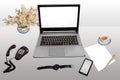 Work place with laptop desktop phone smart phone white paper and pen with morning tea isolated.