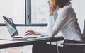 Work Process in Modern Office. Young Woman Account Manager Working at Wood Table with New Business Project. Typing Royalty Free Stock Photo