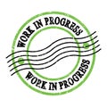 WORK IN PROGRESS, text on green-black grungy postal stamp Royalty Free Stock Photo