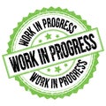 WORK IN PROGRESS text on green-black round stamp sign Royalty Free Stock Photo