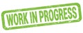 WORK IN PROGRESS text written on green rectangle stamp Royalty Free Stock Photo