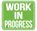 WORK IN PROGRESS, text written on green stamp sign Royalty Free Stock Photo