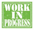 WORK IN PROGRESS, text written on green stamp sign Royalty Free Stock Photo