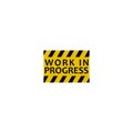 Work in progress warning sign text isolated on white background Royalty Free Stock Photo