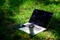 Work and relax in natural environment. Green office. Its coffee time. Coffee take away. Coffee break outdoors. Laptop Royalty Free Stock Photo