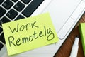 Work Remotely memo stick. Laptop for remote job