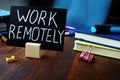 Work remotely sign on the desk about remote job Royalty Free Stock Photo