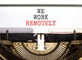 We work remotely symbol. Concept words We work remotely typed on beautiful retro old typewriter. Beautiful white background. Royalty Free Stock Photo