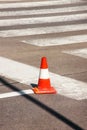 Work on road. Construction cone. Traffic cone, with white and orange stripes on asphalt. Street and traffic signs for signaling. Royalty Free Stock Photo