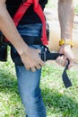 Soft focus close up young man Asian wear the safety harness for job at height