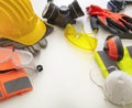 Work safety protection equipment background. Industrial protective gear on white Royalty Free Stock Photo