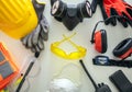 Work safety protection equipment background. Industrial protective gear on white Royalty Free Stock Photo