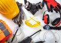 Work safety protection equipment background. Industrial protective gear on white Royalty Free Stock Photo