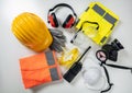 Work safety protection equipment background. Industrial protective gear on white Royalty Free Stock Photo