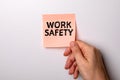 Work Safety. Reminder and Tutorial. Sheet of paper on a white surface