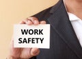 WORK SAFETY word on the white card Royalty Free Stock Photo