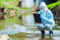 the work of a scientist ecologist, a portrait of an employee who conducts a study of water