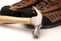 Work shoes and hammer Royalty Free Stock Photo