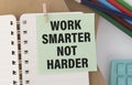 Work Smarter Not Harder Text written on notebook page, red pencil on the right. Royalty Free Stock Photo