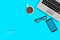 Work space background concept. coffee cup , mobile phone, eye glasses and laptop on blue background,vector Royalty Free Stock Photo