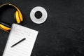 Work space of composer or dj with headphones and notes black background top view mock-up Royalty Free Stock Photo