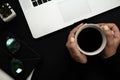 Work space laptop, plant, coffee cup, pencil on black table Flat lay, Workspace Royalty Free Stock Photo