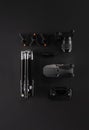 Work space videographer with laptop, digital camera, memory card, action camera, drone, remote controller, phone and camera Royalty Free Stock Photo