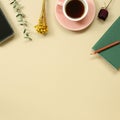 Work and study place. note book, cup of coffee, smart phone with floral decoration Royalty Free Stock Photo