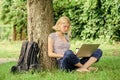 Work in summer park. Girl work with laptop in park. Reasons why you should take your work outside. Lunch time relax or