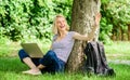 Work in summer park. Girl work with laptop in park. Reasons why you should take your work outside. Woman student sit on